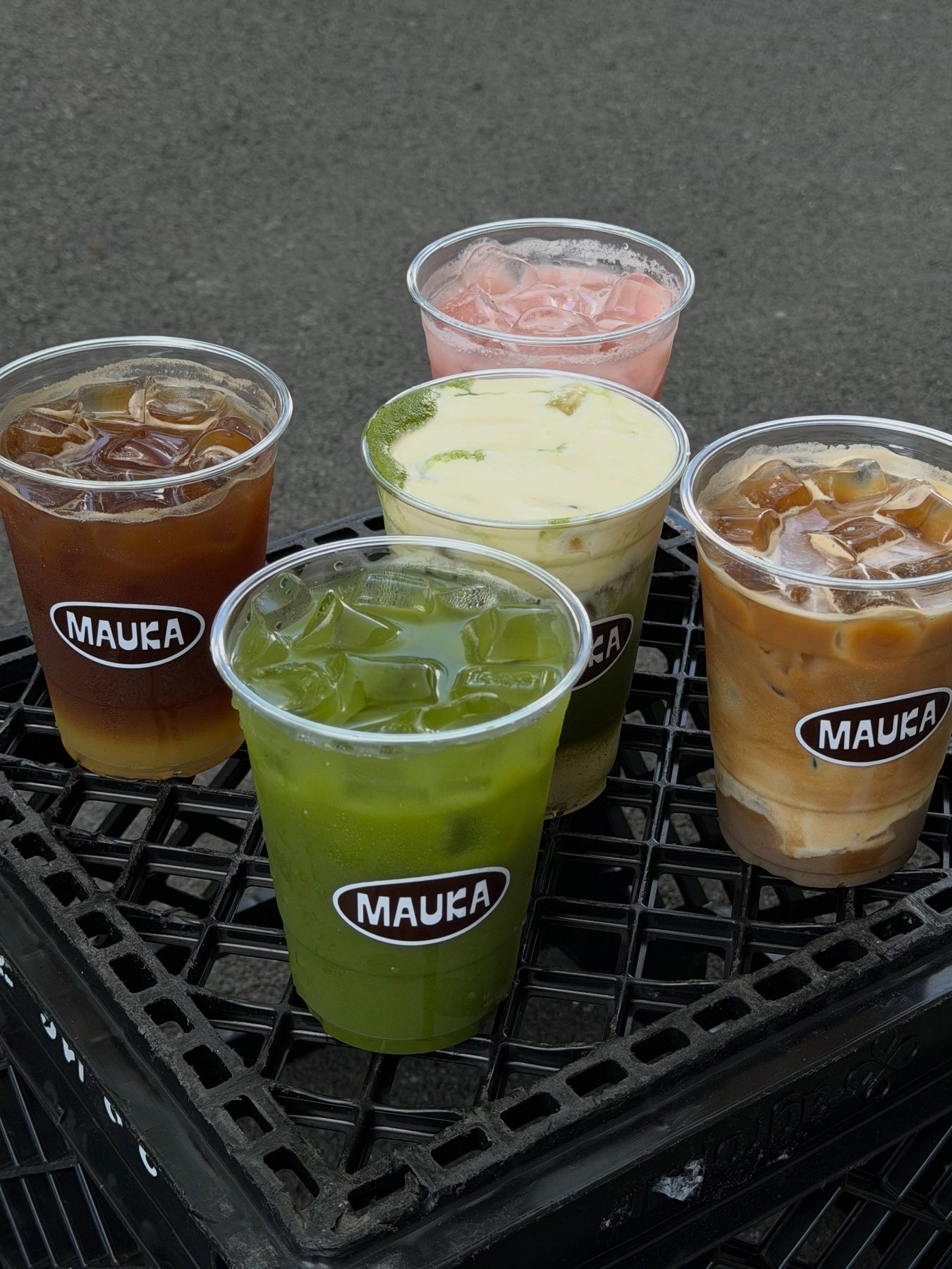 Iced Mauka drinks in branded cups