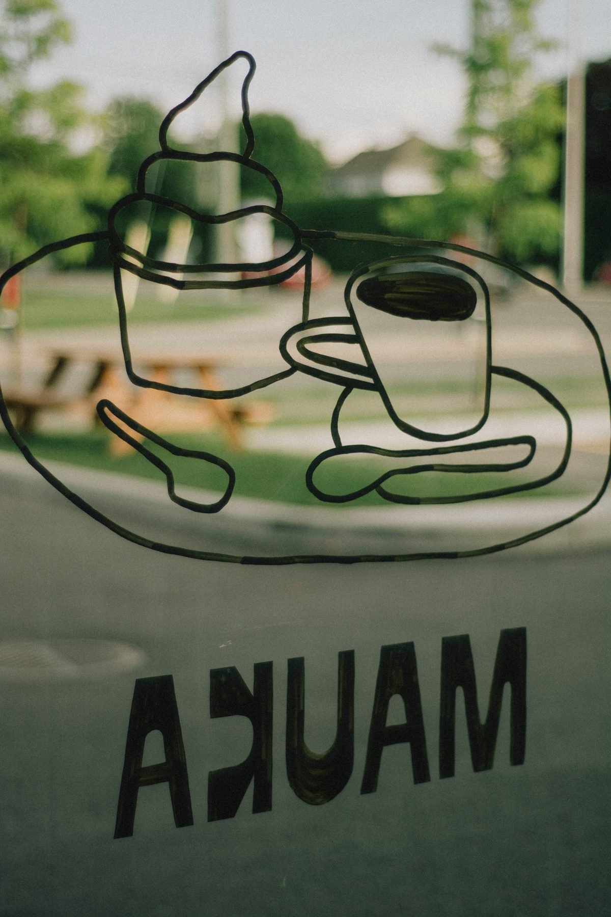 Close-up of the Mauka window illustration painted in black outline